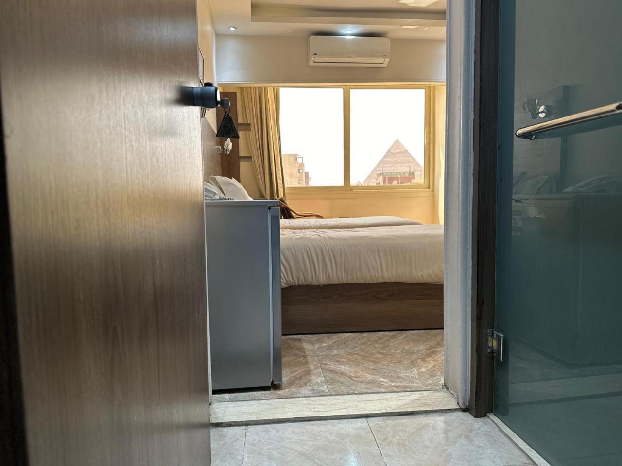 Hassan Pyramids Hotel Kafrat al Jabal Exterior photo