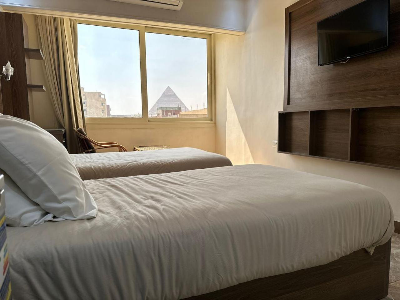 Hassan Pyramids Hotel Kafrat al Jabal Exterior photo